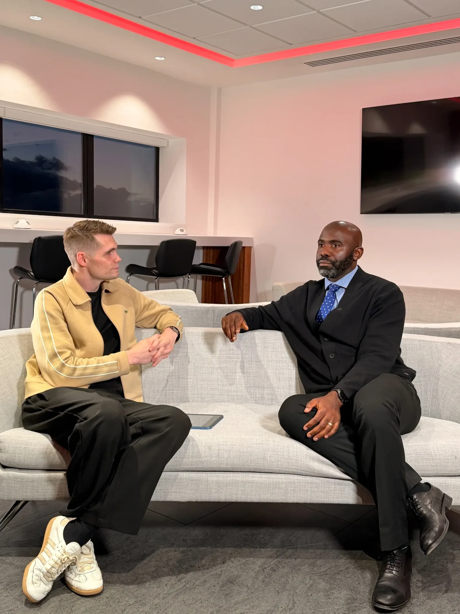 Interview participants in conversation on a multi-camera shoot