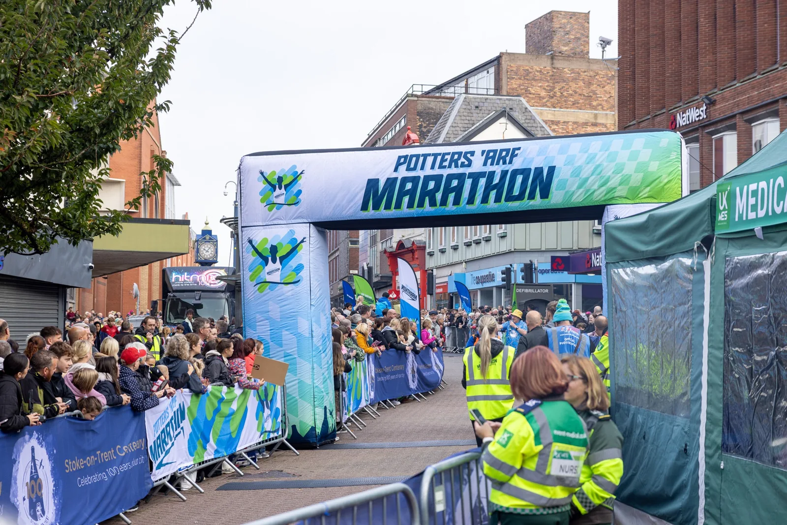 Runners and spectators at the Potters Arf marathon start line
