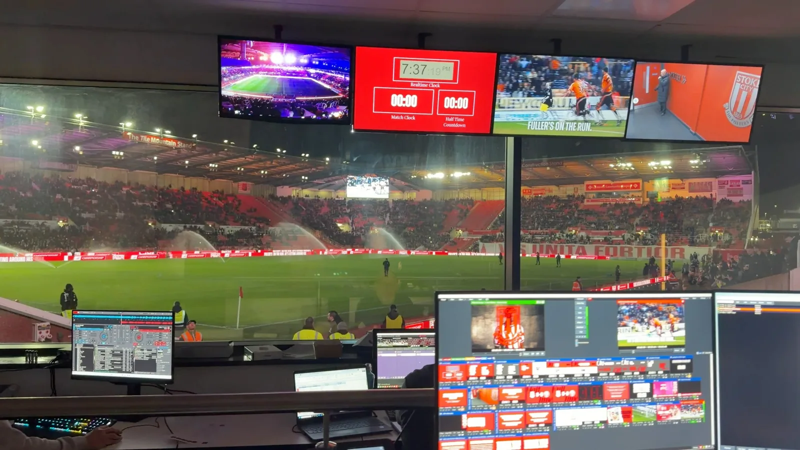 Stoke City stadium control room overlooking the pitch and live production monitors
